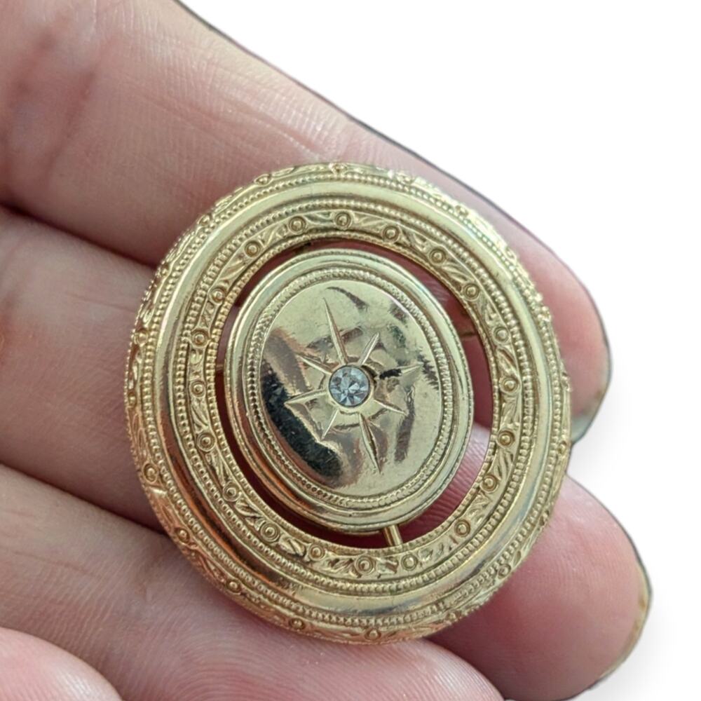 Vintage AVON Swivel Photo Locket Goldtone Metal Oval Brooch Pin Clear Rhinestone